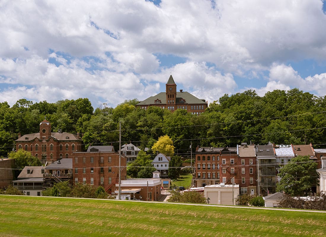 Jerseyville, IL - Aerial View of Apartments and Buildings Surrounded by Green Foliage in Downtown Jerseyville Illinois